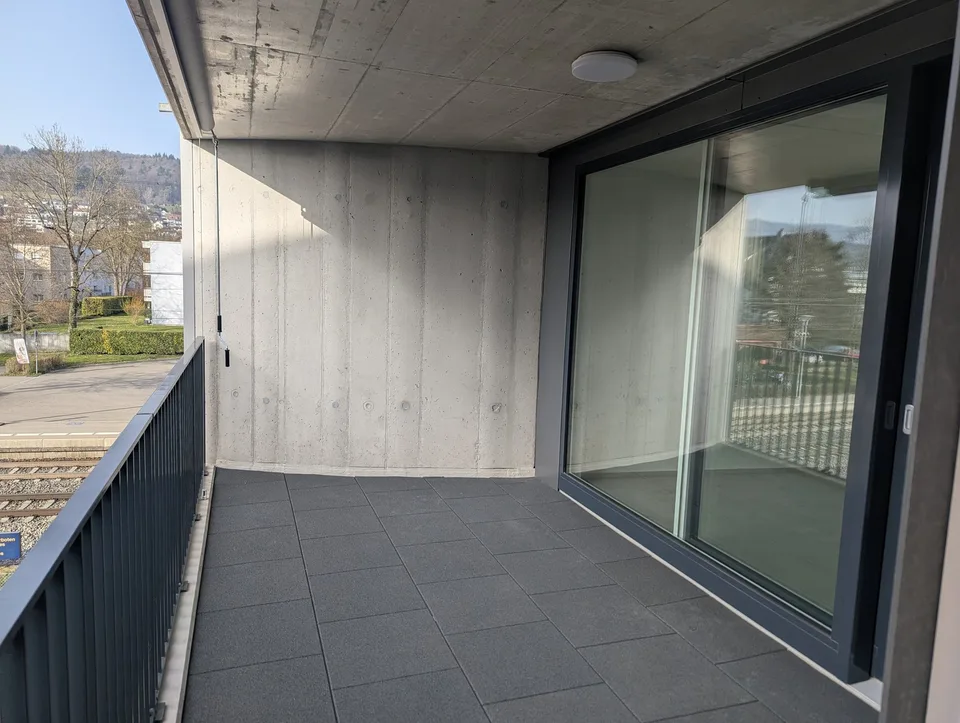 Erstbezug direkt am Bahnhof Buchs ZH  Modernstes Wohnen mit Glasfaser, LAN-Verkabelung und E-Mobility-Option.