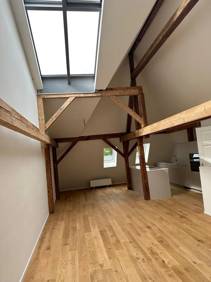 Exklusive Maisonette-Dachwohnung im Paulusquartier mit Gartensitzplatz