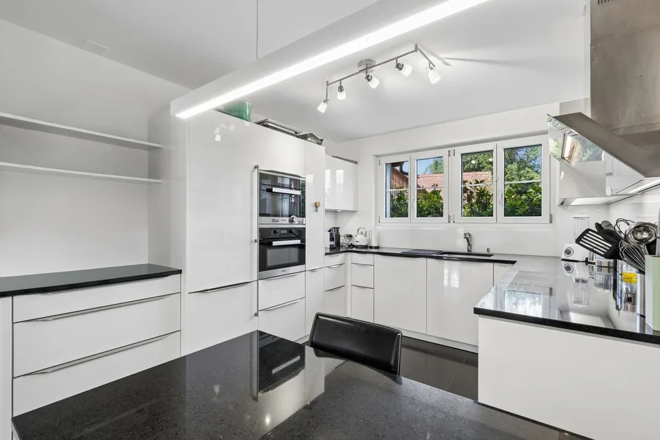 Casa a schiera moderna di 4,5 locali con giardino soleggiato