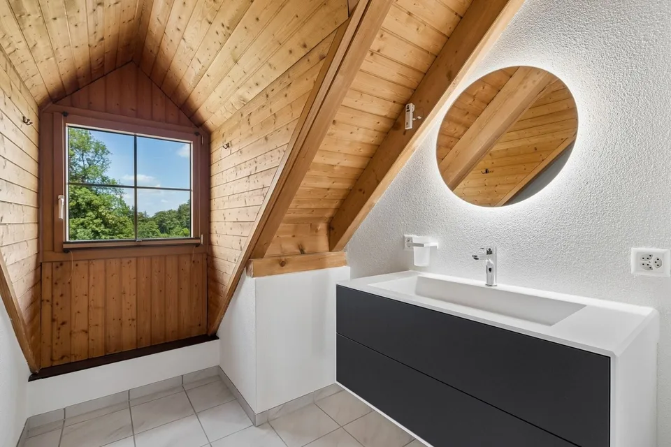 Casa a schiera moderna di 4,5 locali con giardino soleggiato