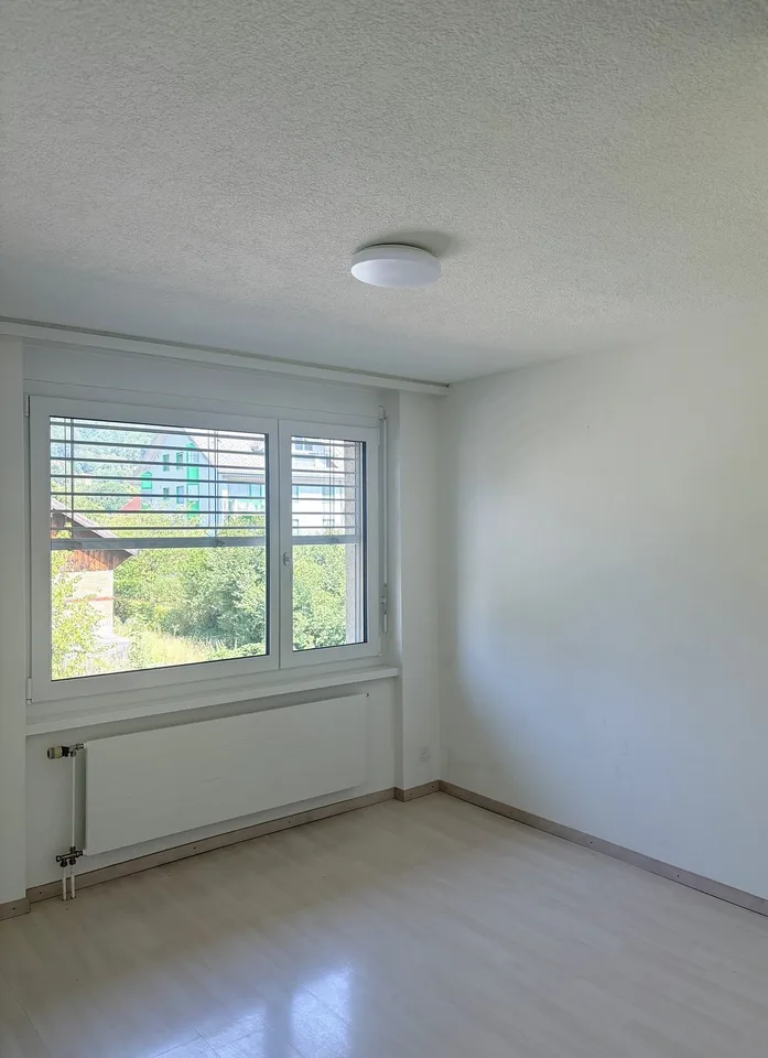 Familienfreundliche 4.5-Zimmer-Dachwohnung mit schöner Weitsicht