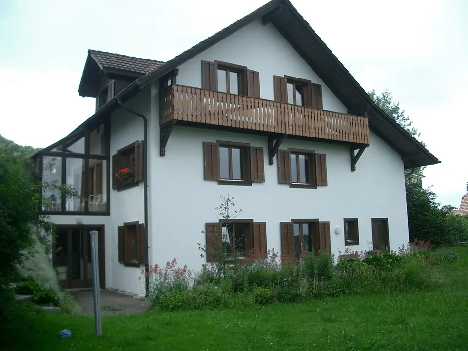Einfamilienhaus mit grossem Garten und Wintergarten