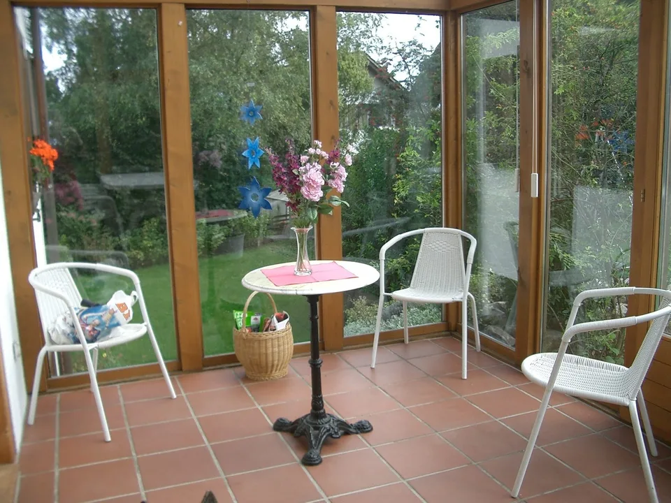 Einfamilienhaus mit grossem Garten und Wintergarten