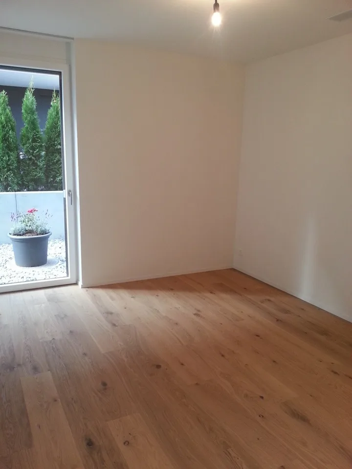 Wunderschöne Wohnung mit Gartensitzplatz in Boll