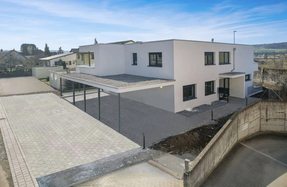 Exklusive 4,5-Zimmer-Maisonette-Neubauwohnung mit Terrasse, Balkon und Garten