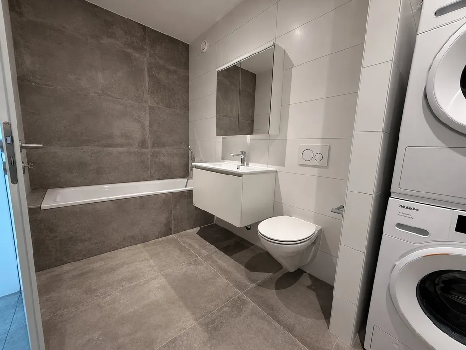 Neue Wohnung im Zentrum des Viertels MIC in Marly