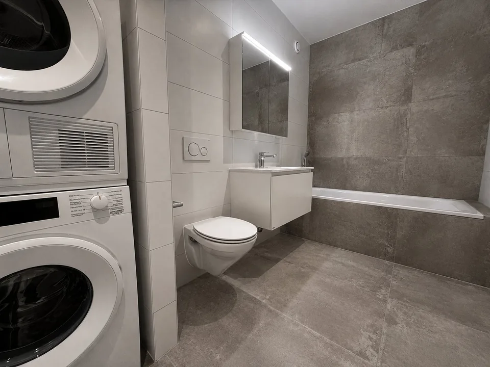 Neue Wohnung im Zentrum des Viertels MIC in Marly