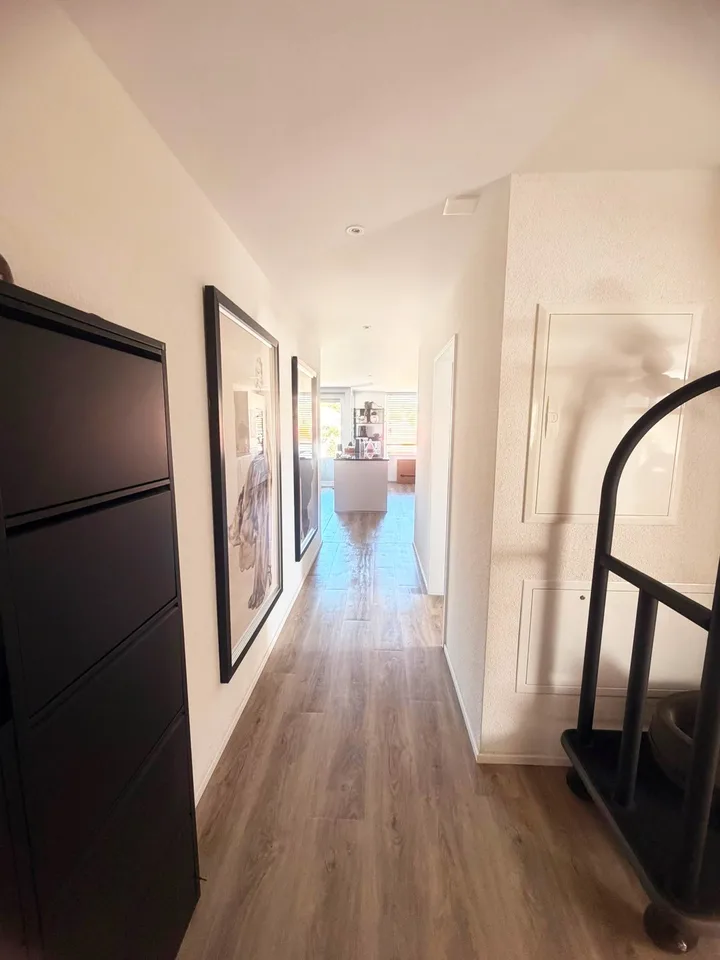 AUSSERGEWÖHNLICHE MAISONETTEWOHNUNG MIT AUSSICHT IM DORFHERZEN