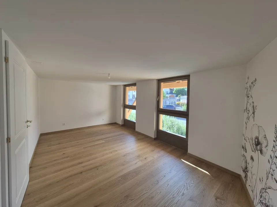 Duplex dans une ferme historique du 18ème siècle, exclusivement rénovée au moyen de matériaux nobles, au centre du village de Gumefens