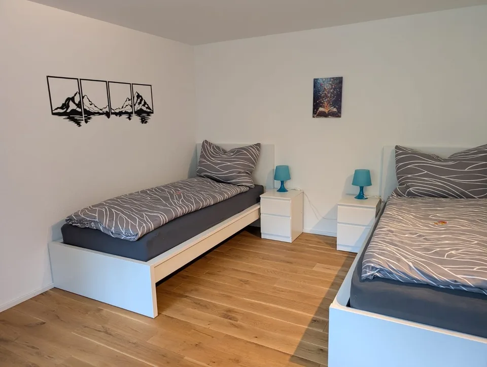 Hochwertig ausgebaute 3,5-Zimmer-Einliegerwohnung mit separatem Eingang, Echtholzböden & Miele-Küche