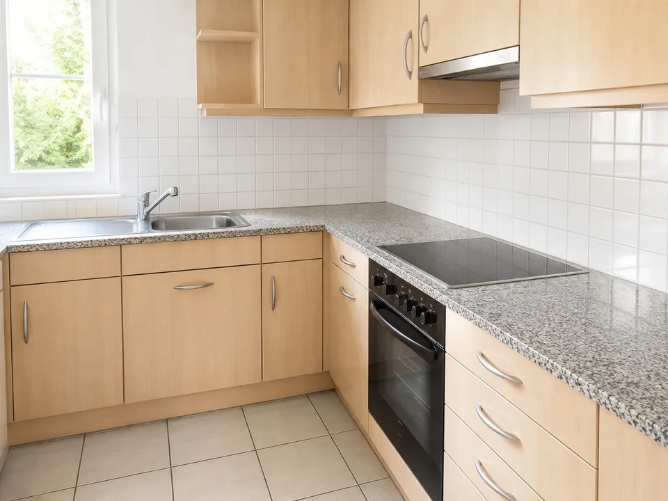 Helle Parterrewohnung mit Garten und Tiefgaragenplatz
