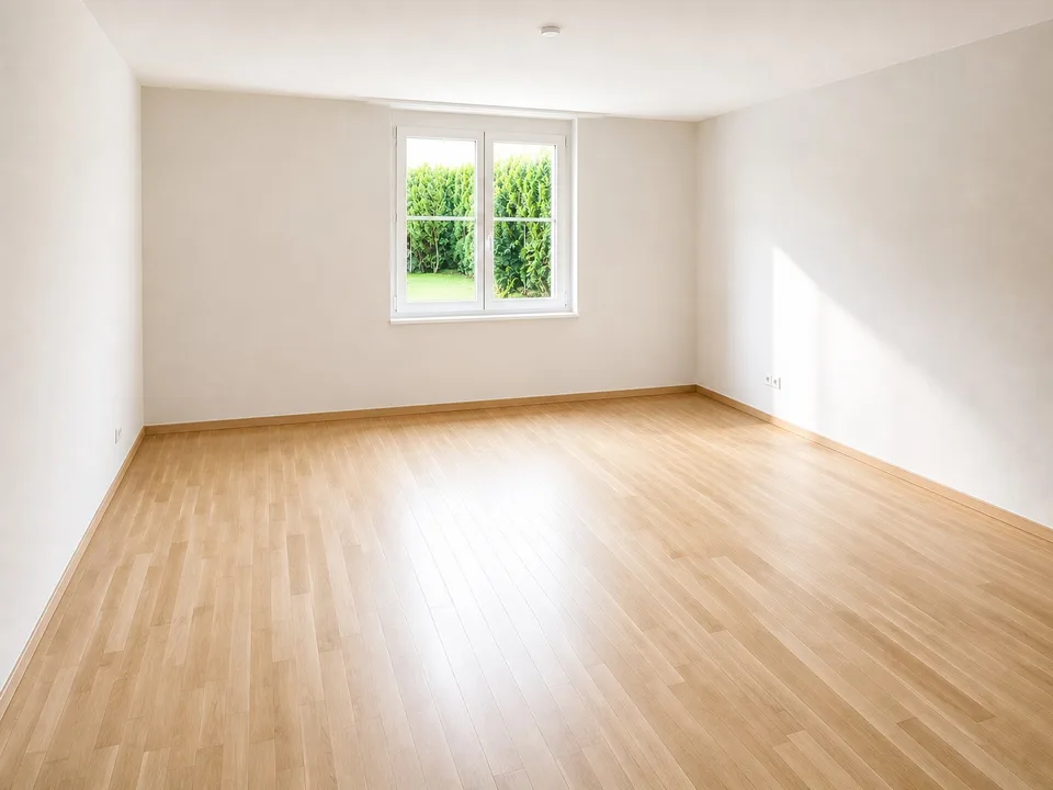 Helle Parterrewohnung mit Garten und Tiefgaragenplatz