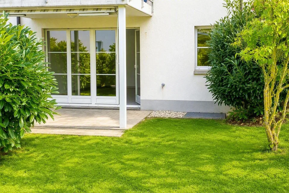 Helle Parterrewohnung mit Garten und Tiefgaragenplatz