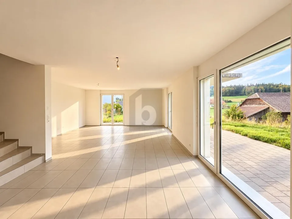 Espace de vie spacieux et grand jardin