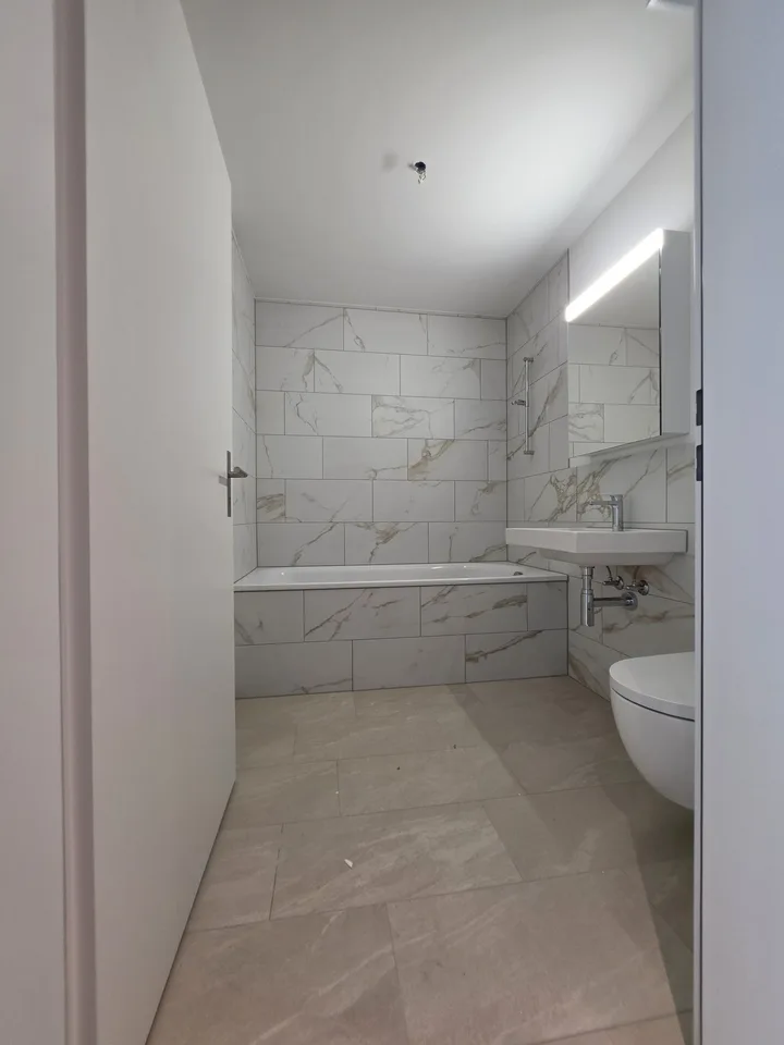 Erstvermietung im HIGH FIVE – 4.5-Zimmer-Wohnung mit Wintergarten & Balkon