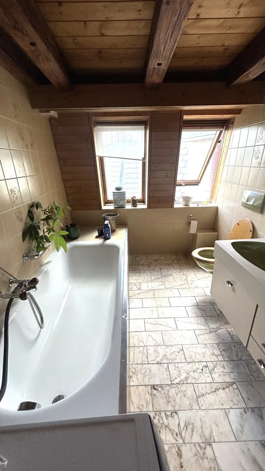 Grosszügige Dachwohnung mit viel Charme & Dachterrasse mitten im Kreis 3! – Foto 11 von 14