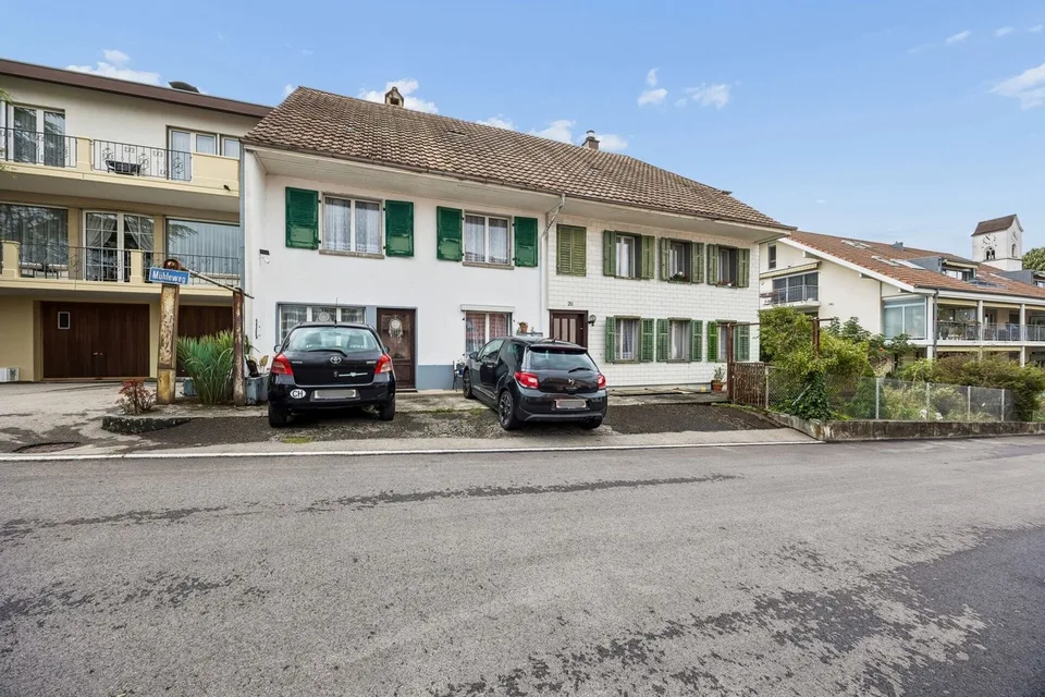 Casa a doppia famiglia su un grande terreno con potenziale di sviluppo – foto 12 di 13