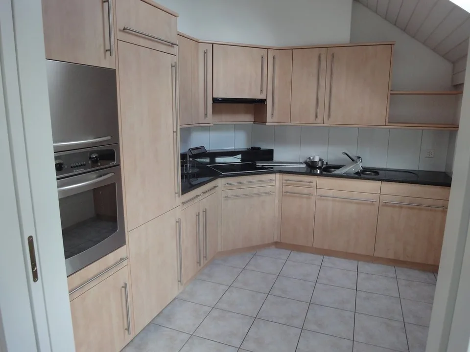 Modern attic apartment – photo 4 of 5