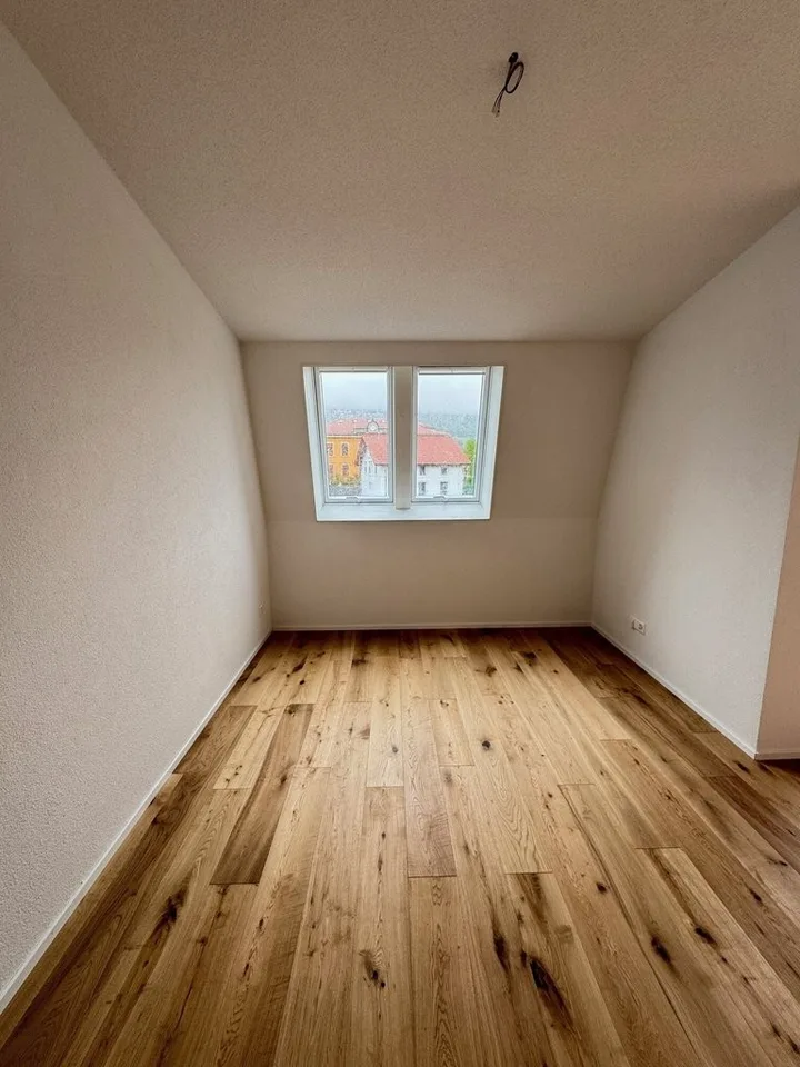 Modernes Wohnen im Neubau: 1.5-Zimmer-Wohnung mit Balkon im 3. OG – Foto 3 von 12