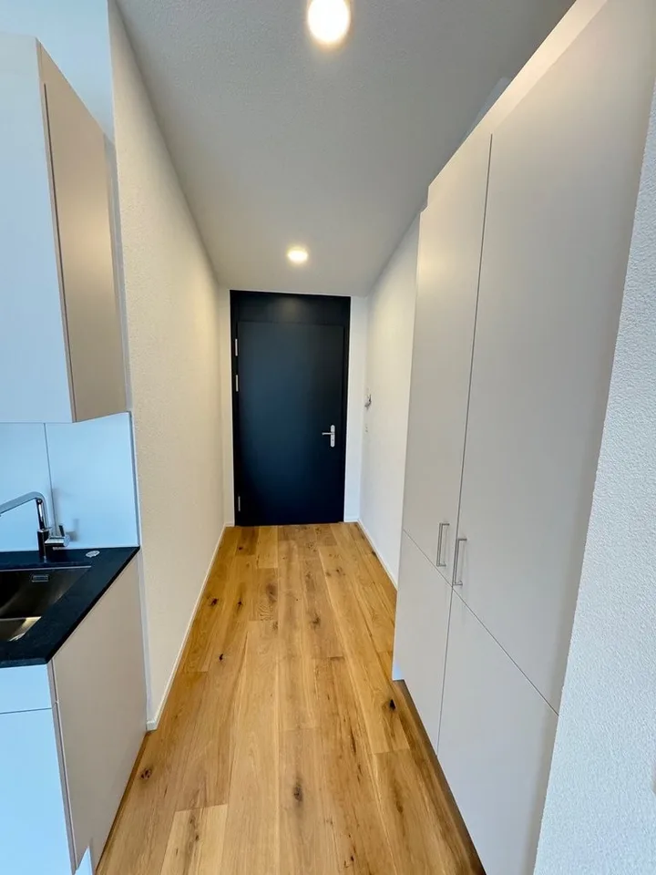 Modernes Wohnen im Neubau: 1.5-Zimmer-Wohnung mit Balkon im 3. OG – Foto 7 von 12