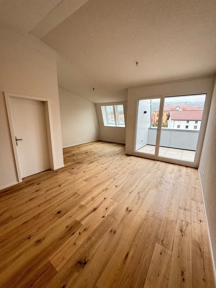 Modernes Wohnen im Neubau: 1.5-Zimmer-Wohnung mit Balkon im 3. OG – Foto 2 von 12